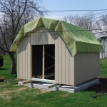 Mesh tarps keep shingles in place during delivery